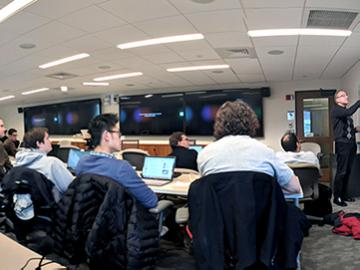 Photo of students and faculty in Computationally-Enabled Medicine classroom